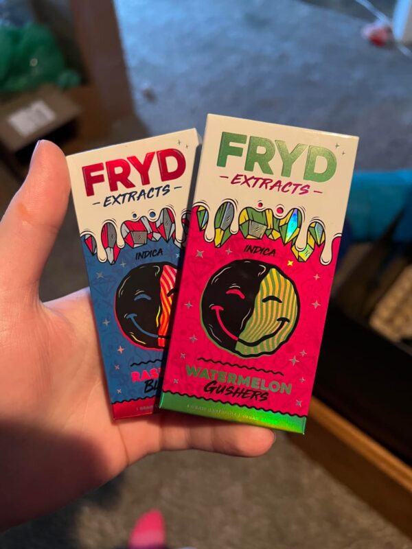  customer receiving their Fryd Extracts package with a satisfaction guarantee badge.